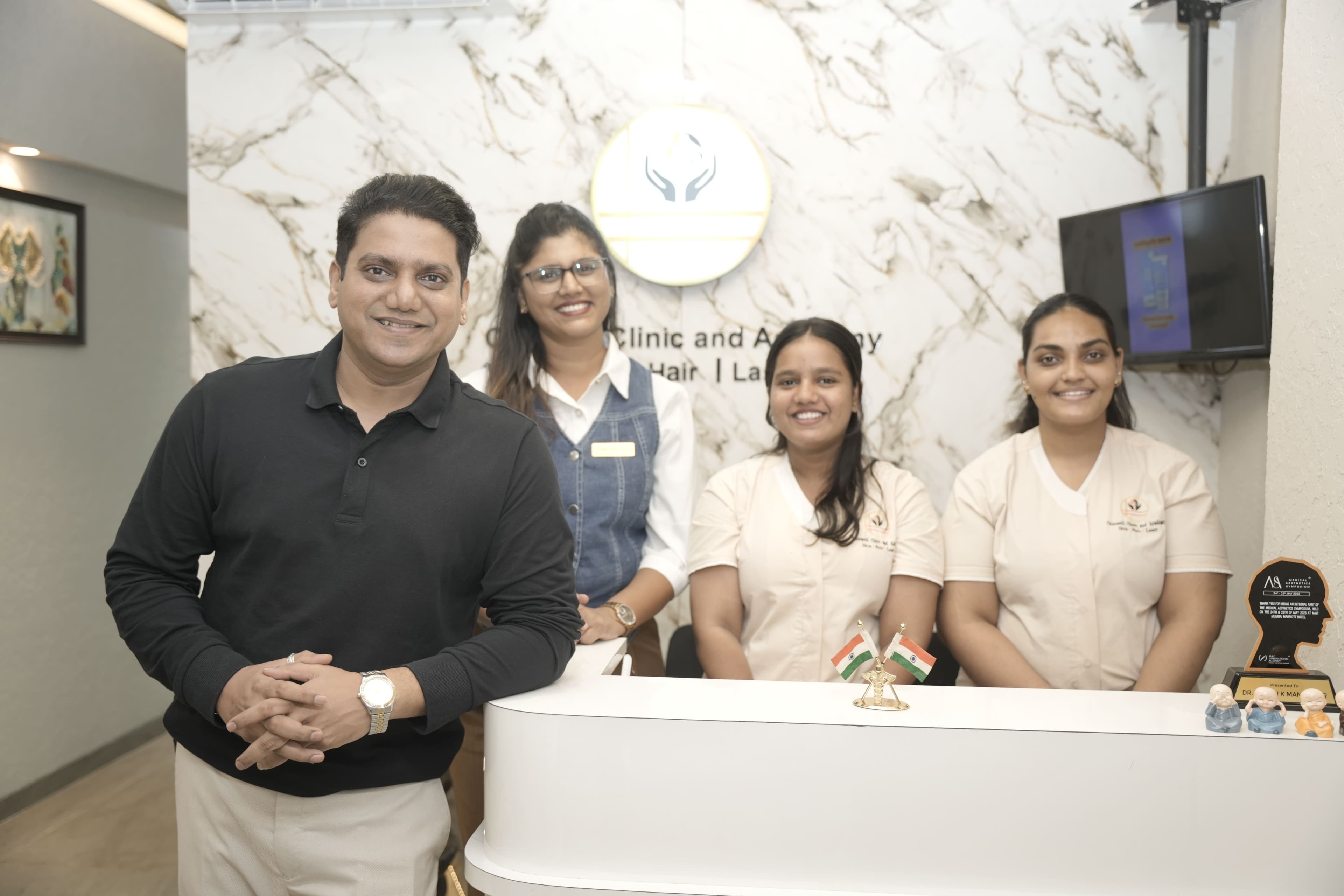 Dr Dinesh K. Manjrekar at Carewell Clinic — slide 3