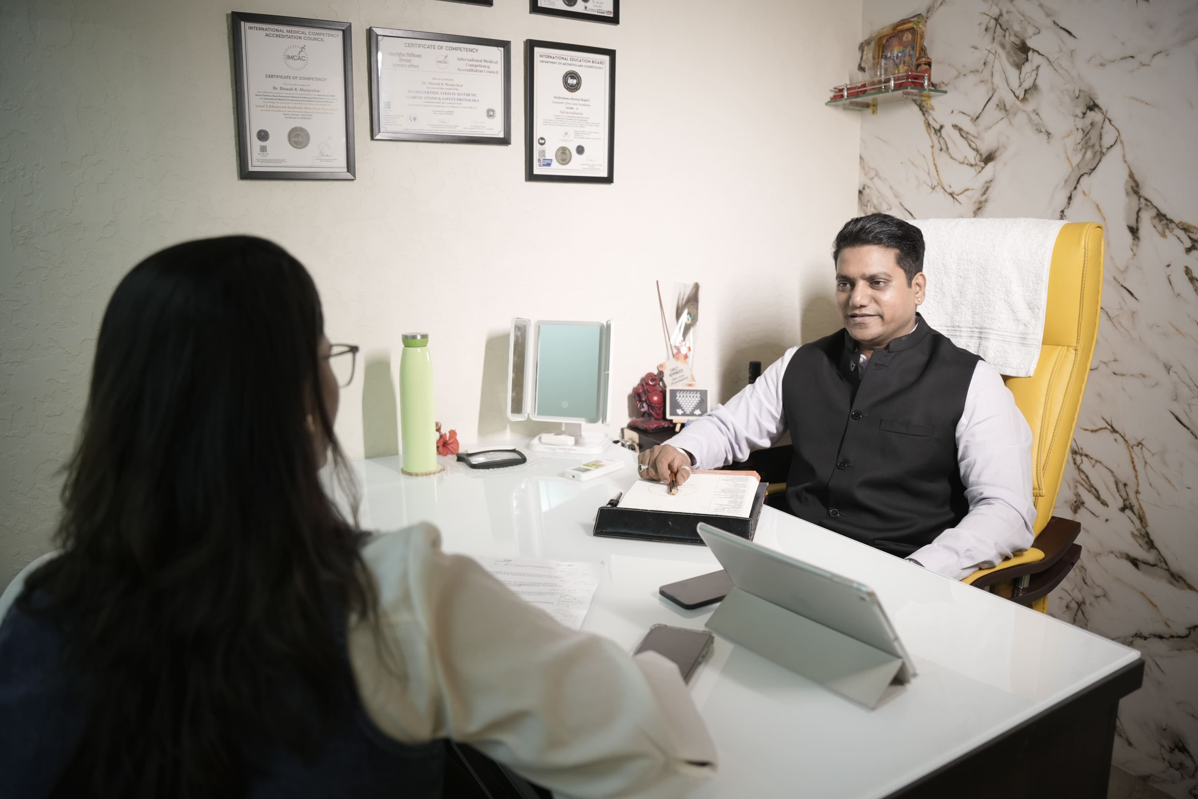 Dr Dinesh K. Manjrekar at Carewell Clinic — slide 2